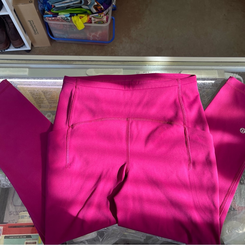 Lululemon swift speed high rise crop 21” rasberry leggings size 6